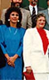 The picture shows Mrs. Ewans and the other female member of the government, Alice Inez Buffett